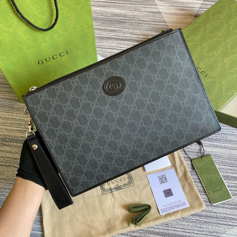 G*u*i clutch bags